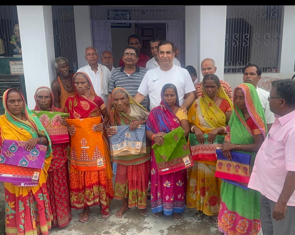 BJP leader AP Pathak distributed sarees among needy women on the eve of Raksha Bandhan
